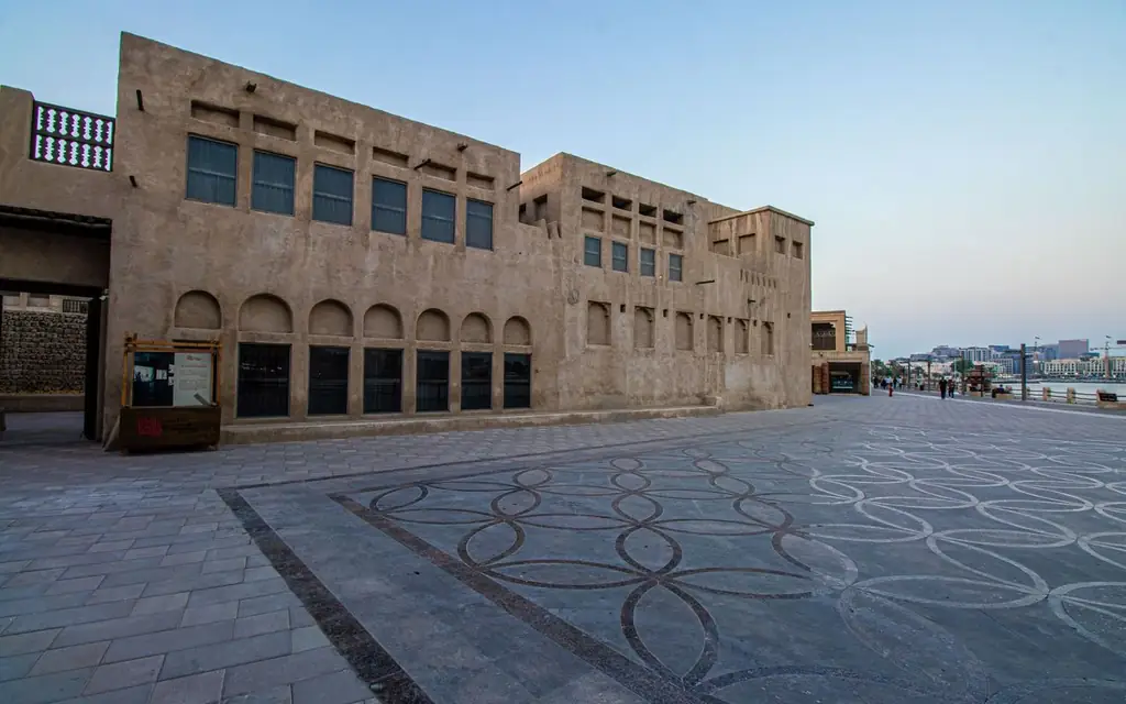 Early morning view of Al Fahidi neighborhood in Dubai, showcasing traditional architecture and quiet streets