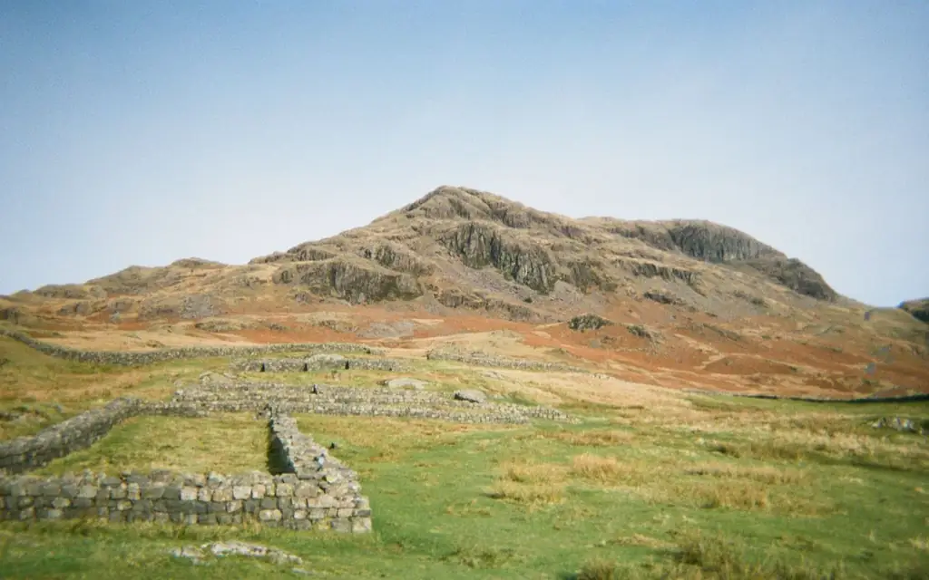 Ruins of Hardknott Fort with a mountainous backdrop in England's Lake District