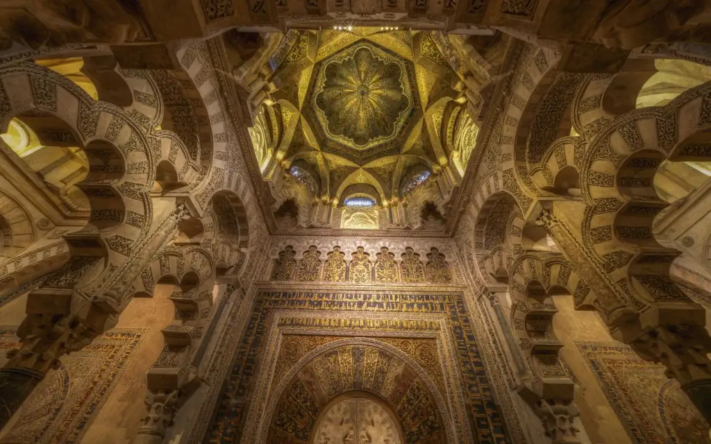 Stunning view of the elaborate arches and decor inside the Mosque-Cathedral of Cordoba, Spain