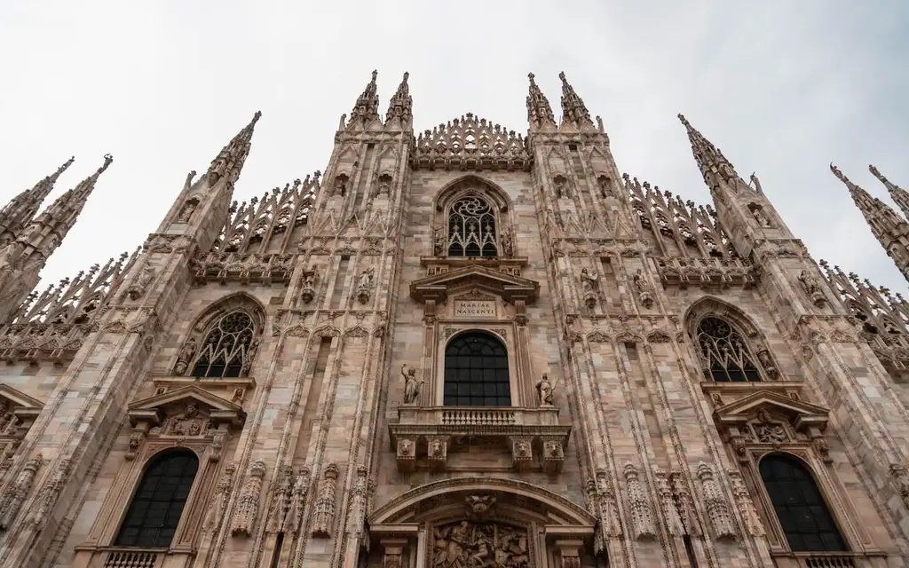 Stunning view of the intricate Gothic facade of Duomo di Milano in Italy