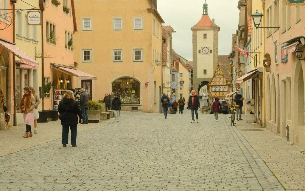 Picturesque street scene in Rothenburg ob der Tauber, showcasing medieval architecture and cobblestone streets