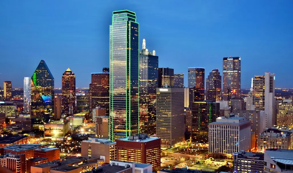 Stunning view of the Dallas skyline at night with illuminated skyscrapers and city lights