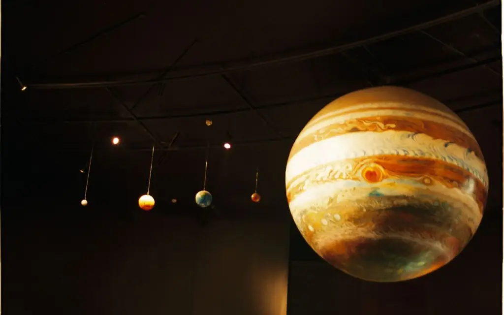 Scale models of solar system planets in a planetarium exhibit