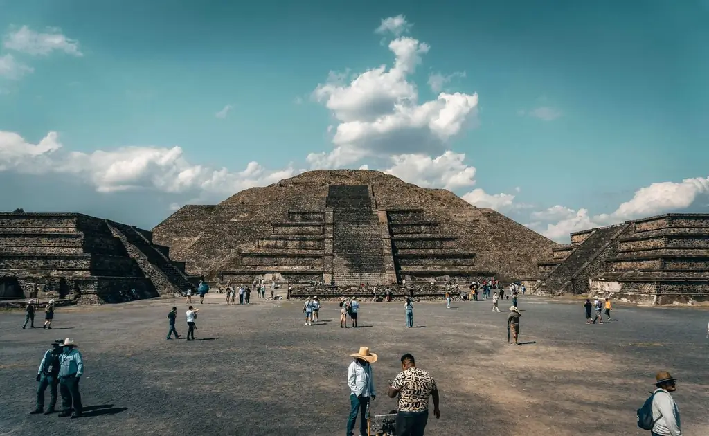 Explore the iconic Pyramid of the Sun in Teotihuacan, Mexico, bustling with visitors