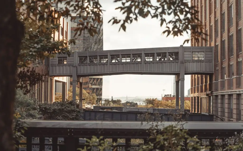 Modern architecture with a bridge over the High Line in New York City highlighting urban design