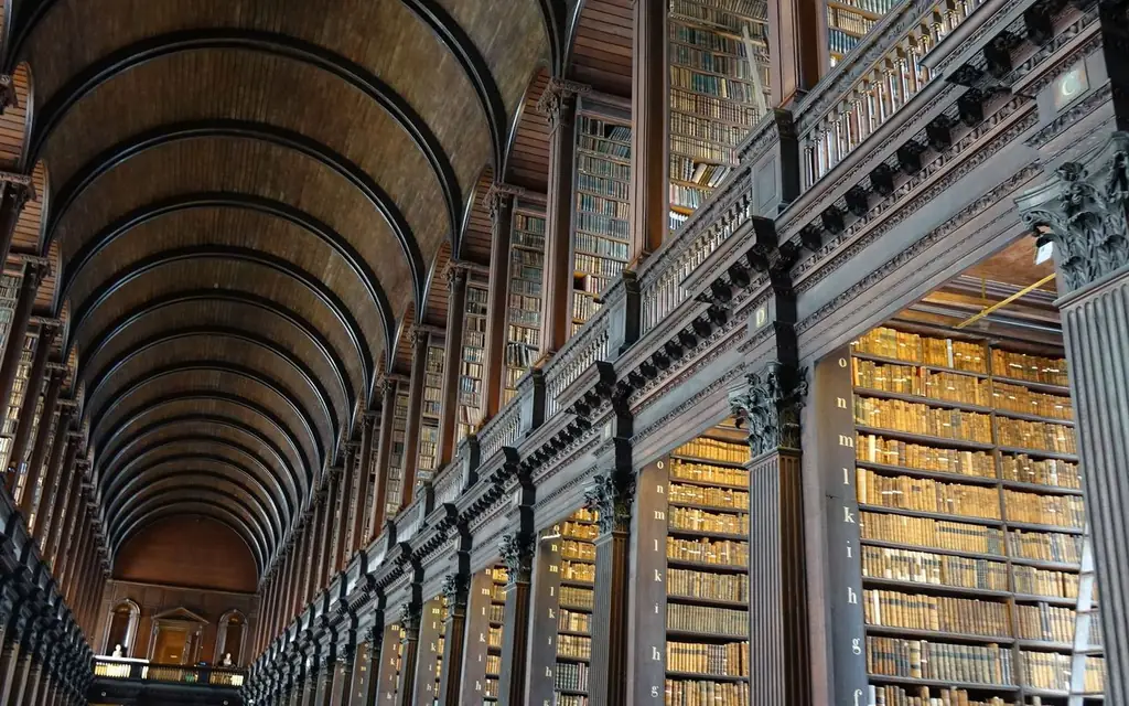 Expansive view of the historic Long Room library in Trinity College Dublin