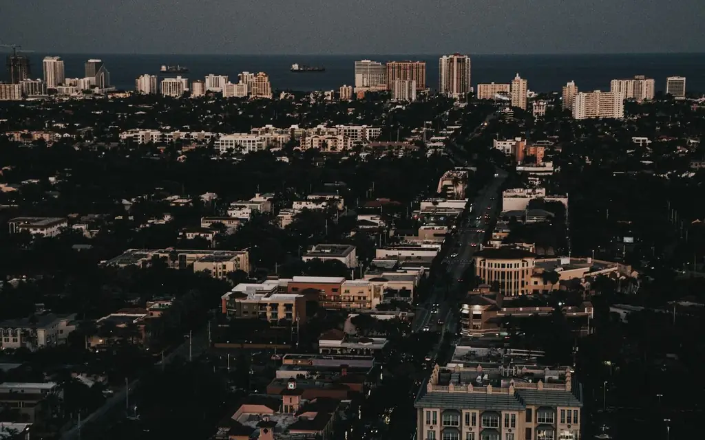 Stunning aerial cityscape of Fort Lauderdale, highlighting the urban skyline and ocean view during twilight