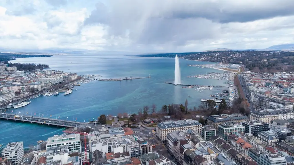 Stunning aerial view of Lake Geneva with Jet d'Eau and surrounding cityscape in Geneva, Switzerland