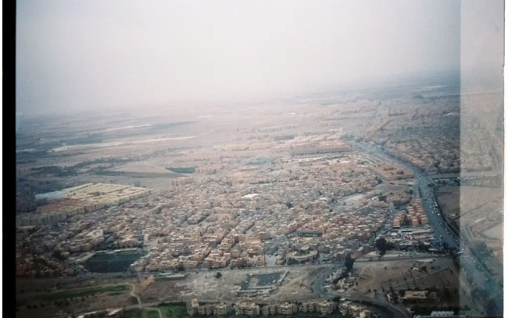 Aerial photograph of Marrakech cityscape enveloped in foggy atmosphere