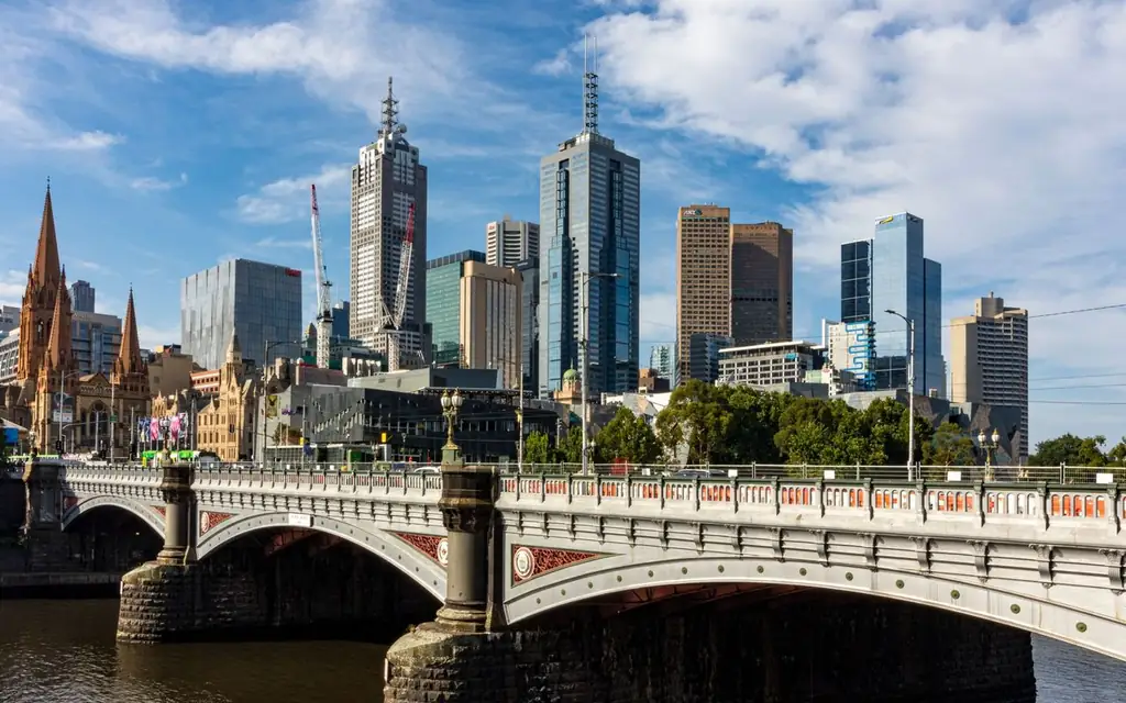 Stunning view of Melbourne's skyline featuring Princes Bridge and Yarra River