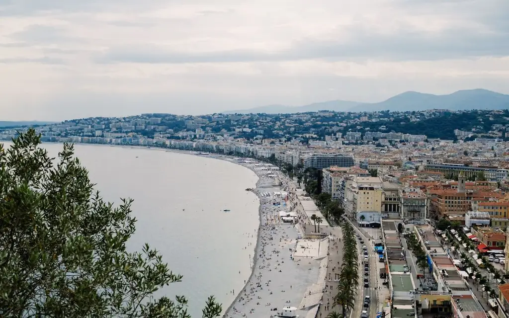 Stunning panoramic aerial view of Nice, showcasing the coastline and urban architecture